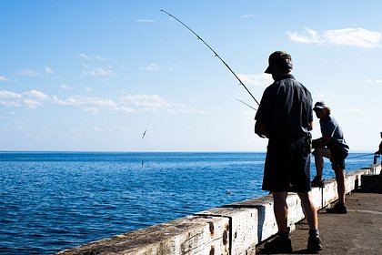 Рыболов поймал огромную макрель размером с человека